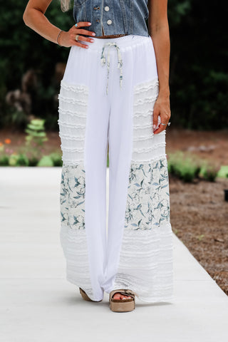 White pants with lace